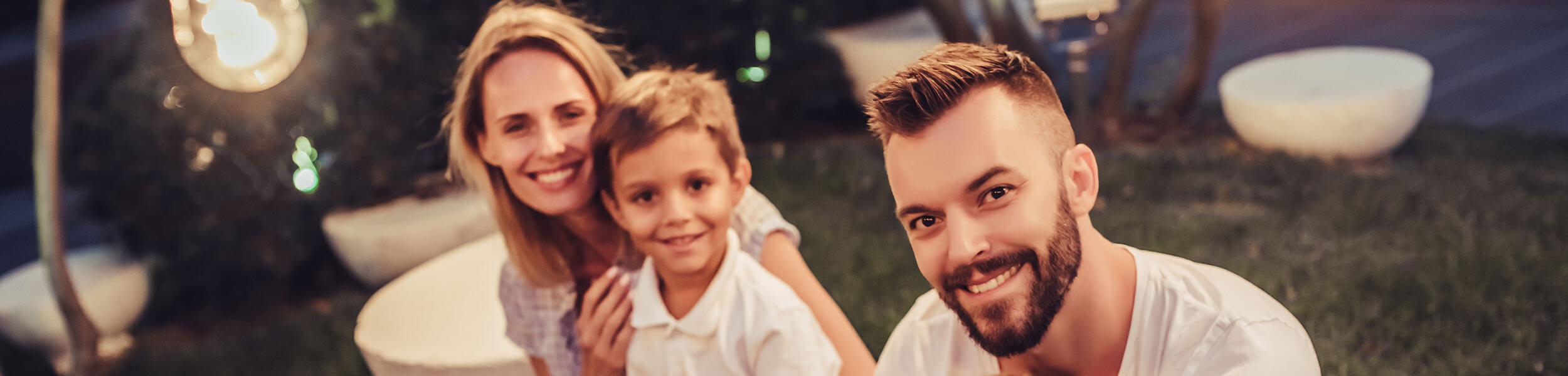 family outside smiling