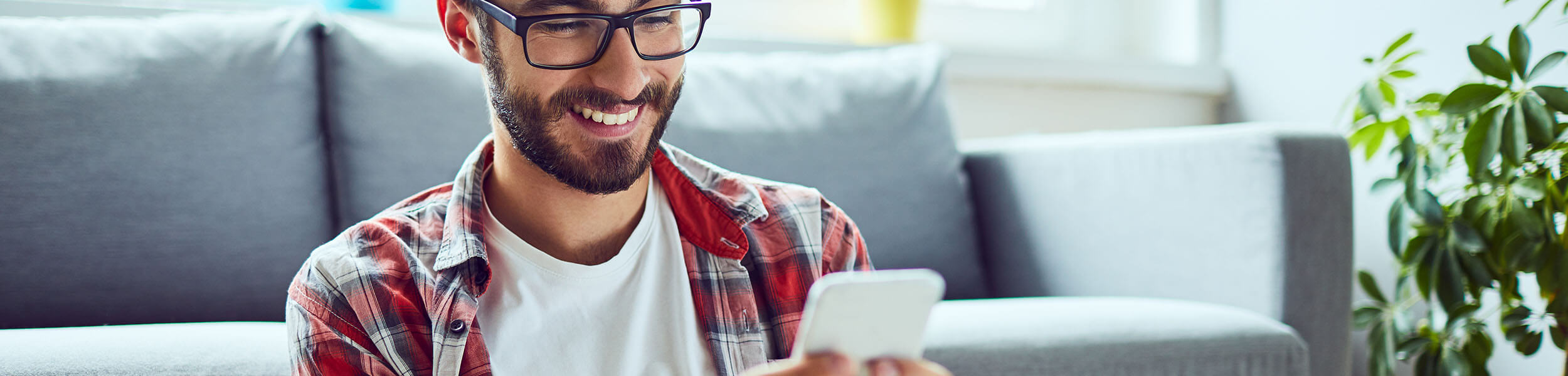 man paying bill on mobile